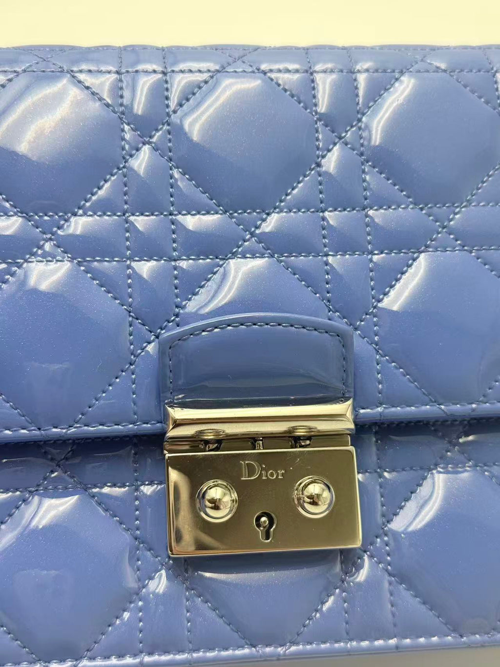 Dior blue patent leather WOC chain bag.