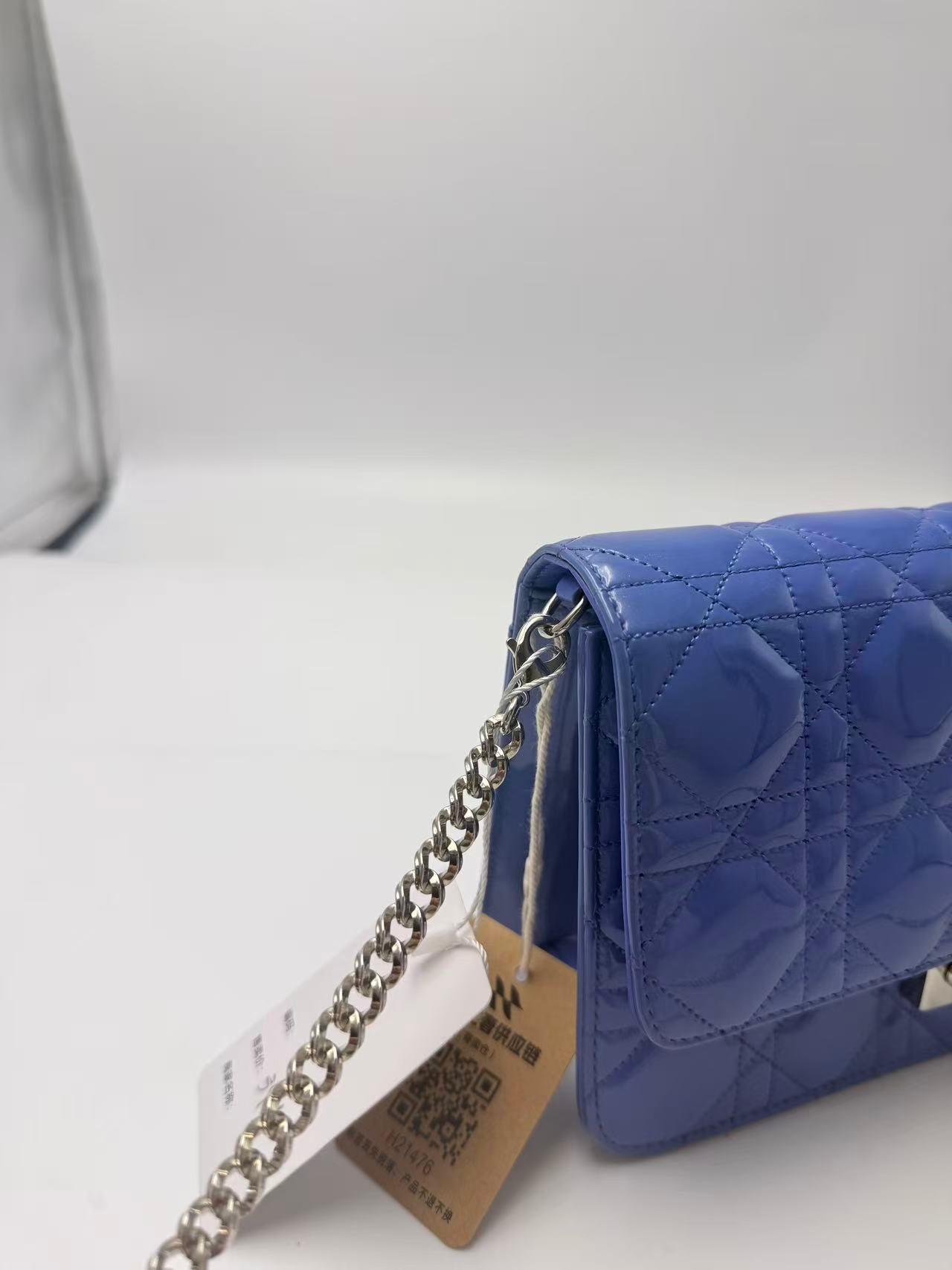 Dior blue patent leather WOC chain bag.