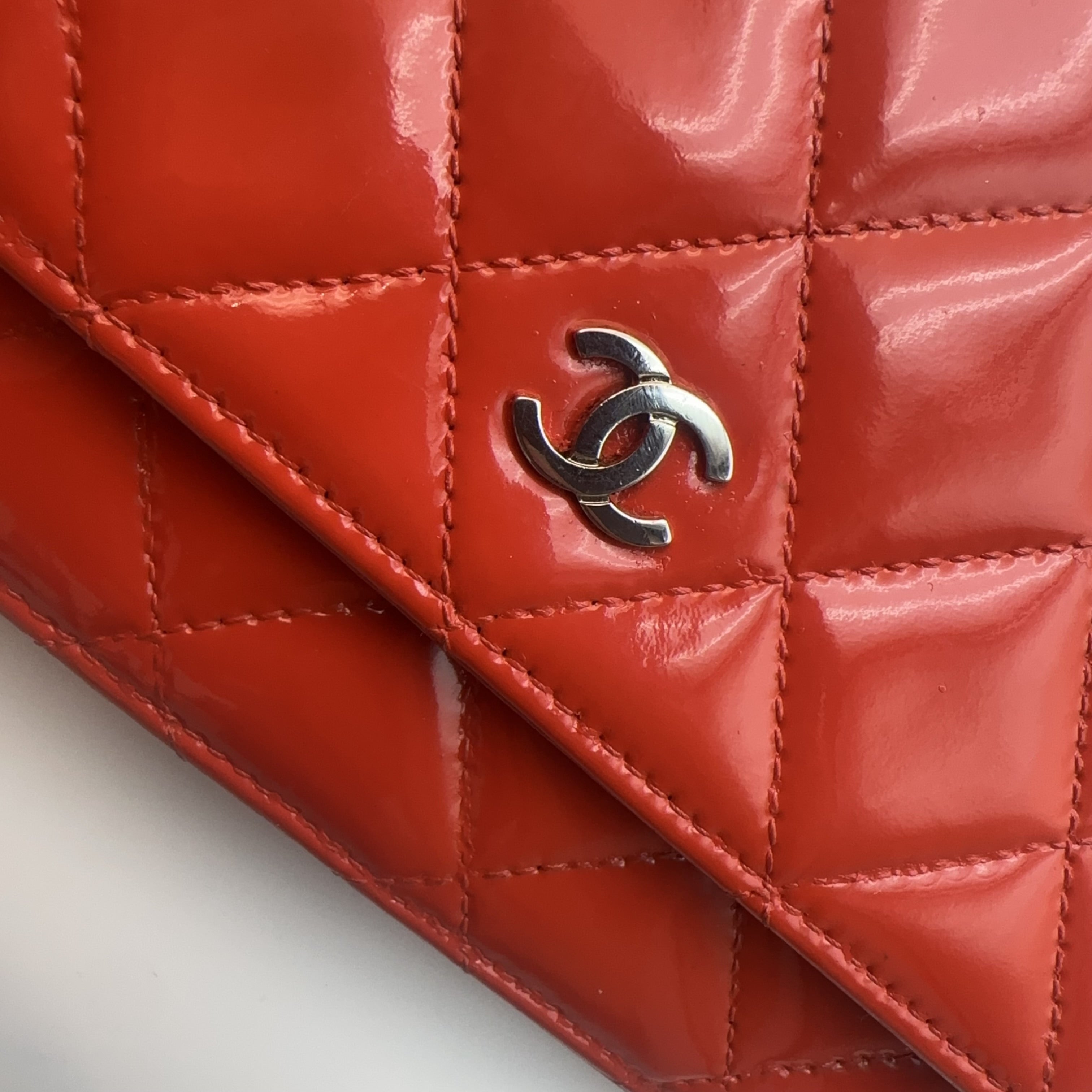 Chanel Orange Patent Leather WOC Chain Bag.