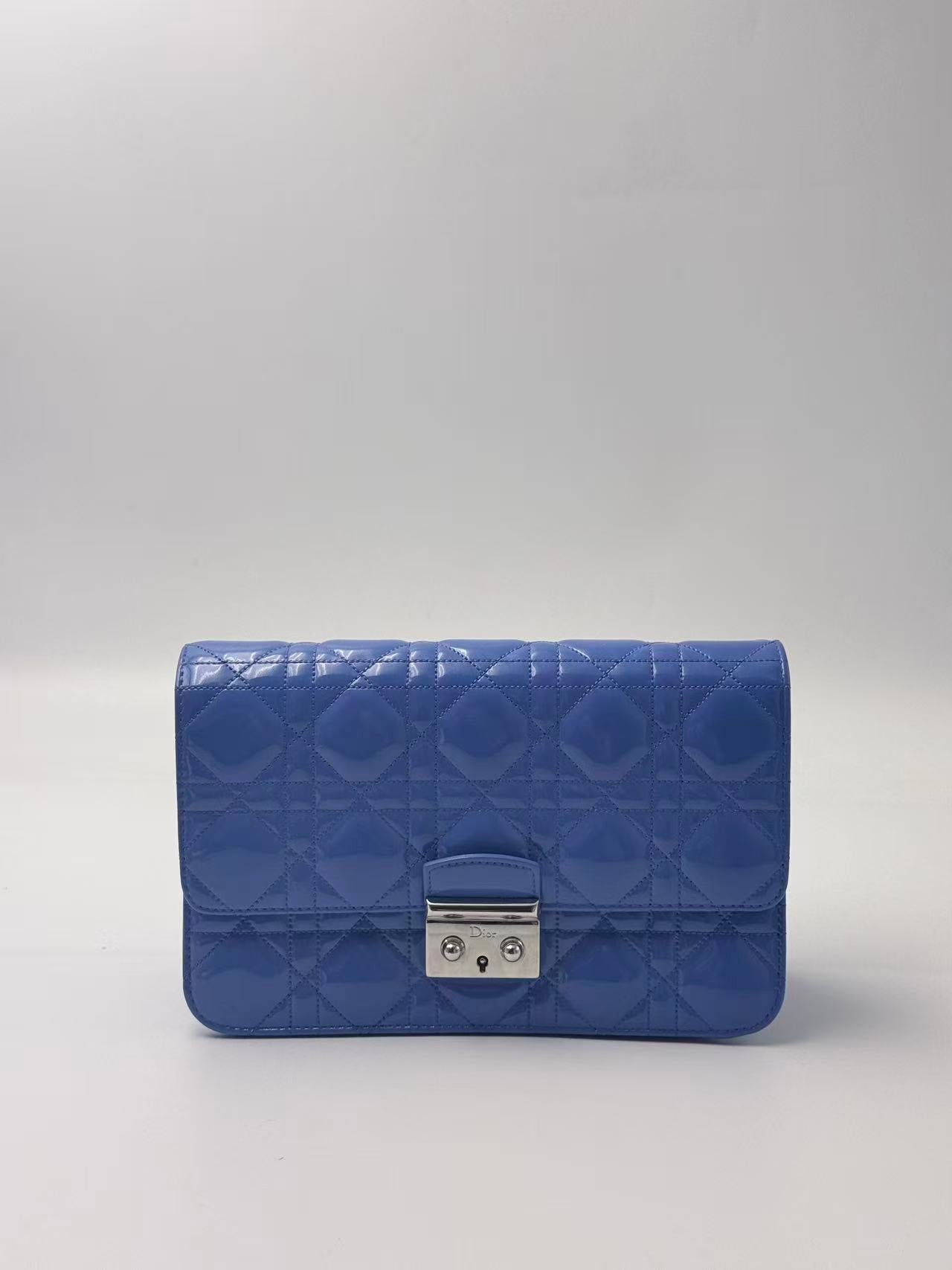 Dior blue patent leather WOC chain bag.