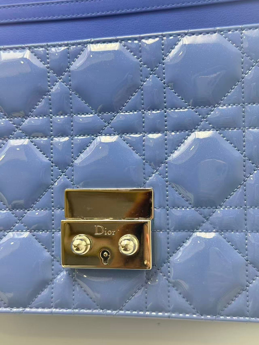 Dior blue patent leather WOC chain bag.