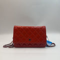 Chanel Orange Patent Leather WOC Chain Bag.