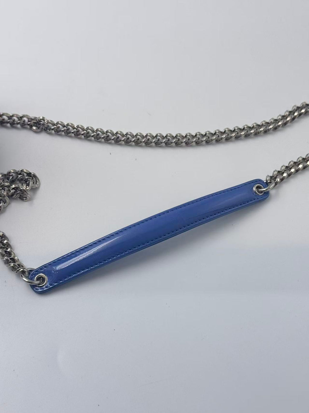 Dior blue patent leather WOC chain bag.