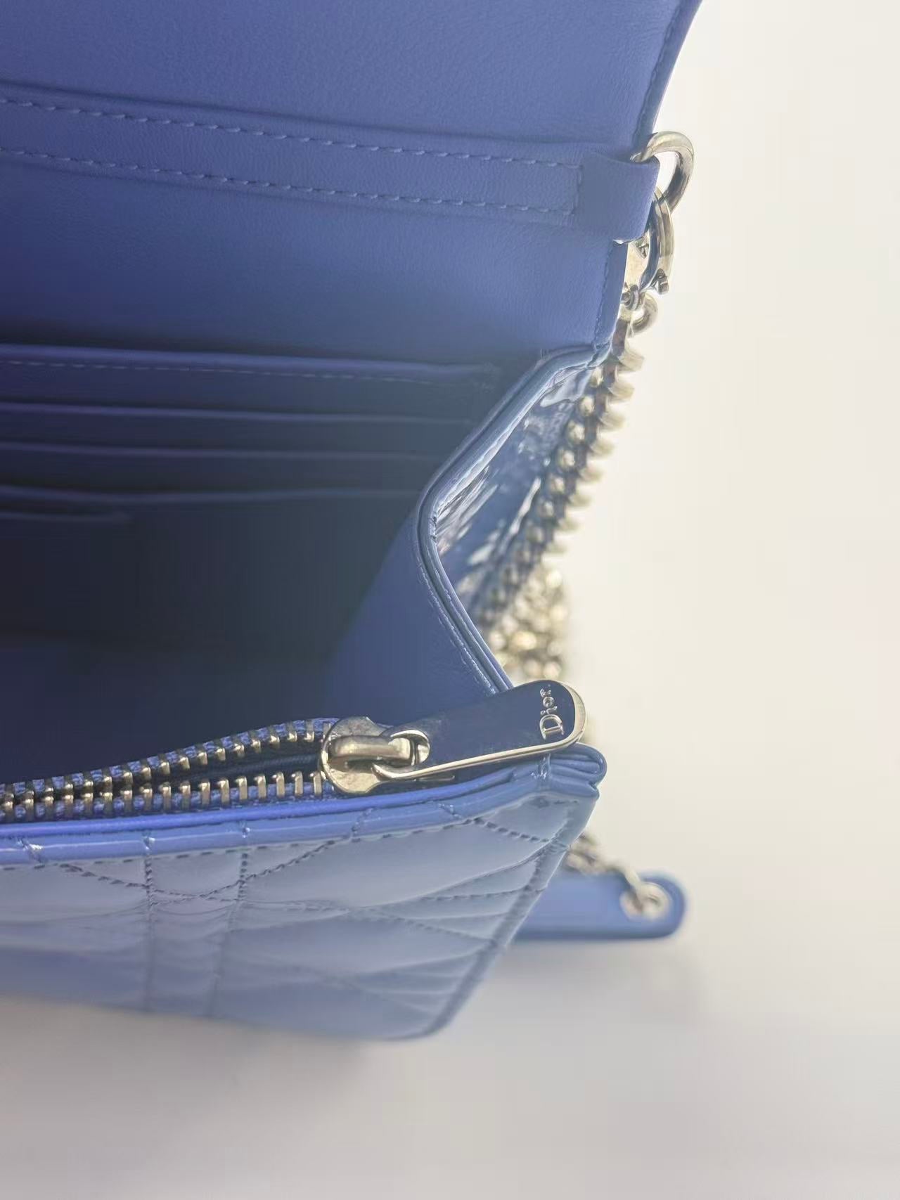 Dior blue patent leather WOC chain bag.